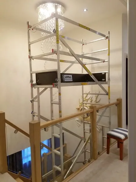 Stair tower set up on a stair for high ceiling work